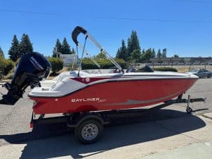Bayliner M17 boat featuring Mercury 90HP outboard motor, ideal for recreational boating and water sp.