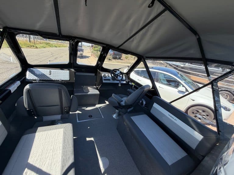 Interior view of the 2026 Thunder Jet Luxor boat with Mercury 150HP engine.