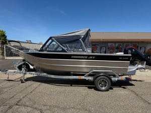 High-performance Thunder Jet Luxor 185 with Mercury 150HP engine on trailer.