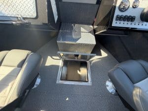 Aluminum storage hatch on Thunder Jet boat interior.