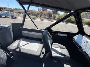 Interior view of the 2026 Thunder Jet Luxor boat with Mercury 150HP engine.