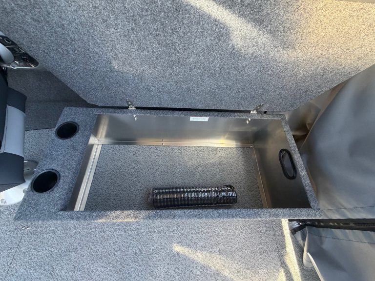 Thunder Jet boat storage compartment with secure lid.