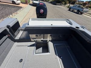 Opti-friendly boat with spacious deck and Mercury 150HP engine.