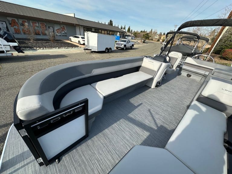 Modern boat lounge with comfortable seating and sun protection for Opti Marine customers.