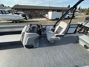 A modern boat helm station featuring steering, navigation, and control systems for optimal marine op.