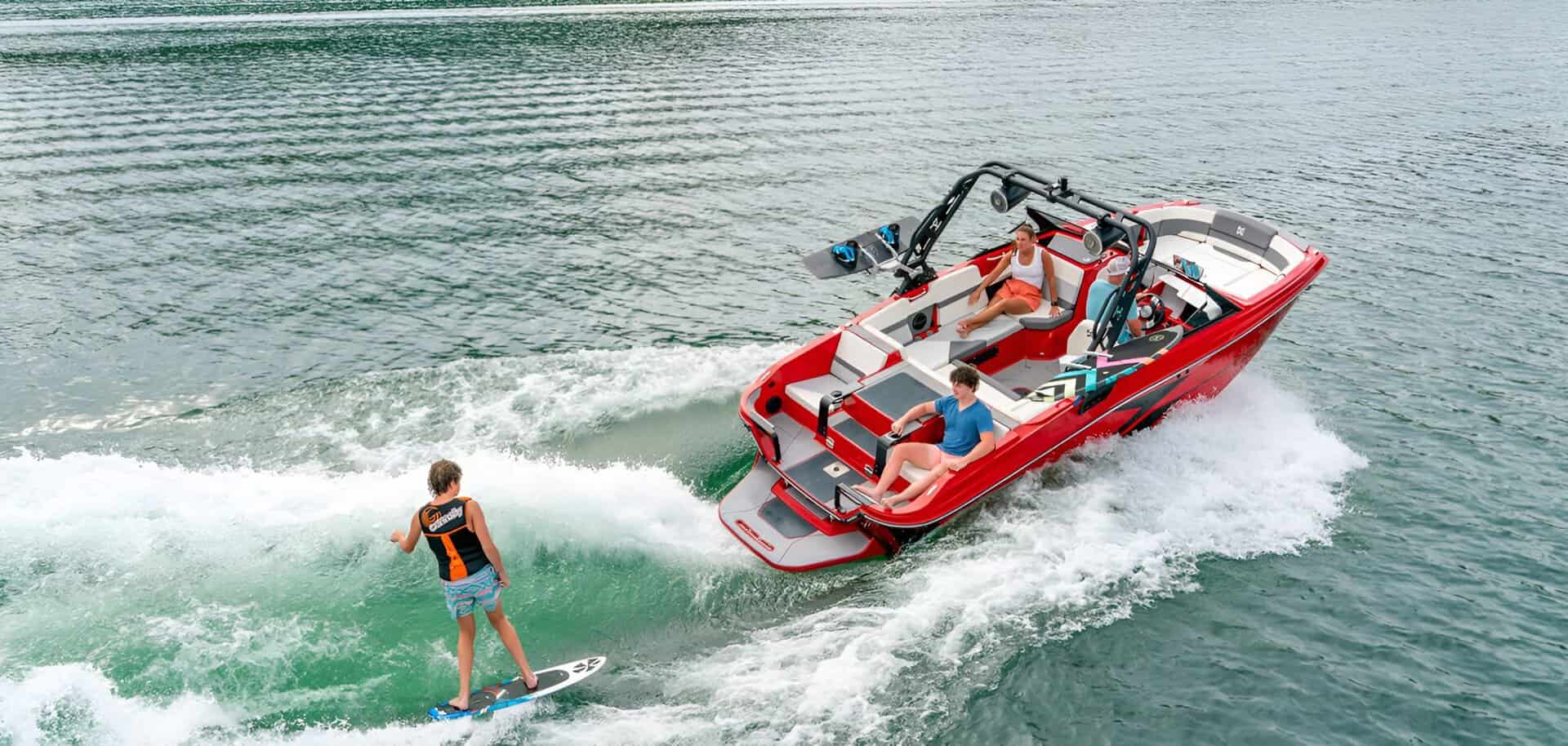 Powerboat with water sports enthusiasts enjoying a day on the water
