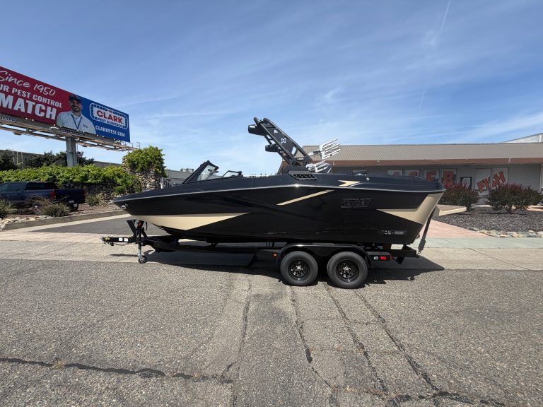 High-performance 2026 HeyDay H 22 surf boat on trailer for sale. Perfect for surfing and water sport.