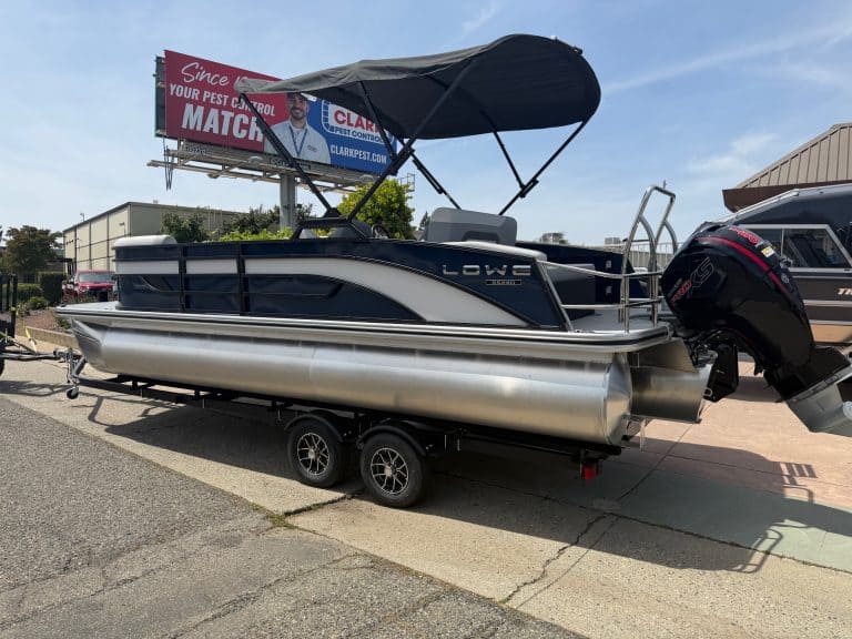 Pontoon boat with outboard motor, ideal for leisure and fishing adventures. Perfect for water recrea.