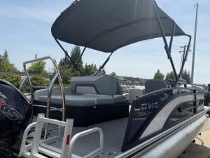 Pontoon boat with canopy and seating for leisure activities.