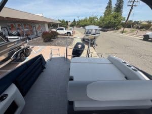Marine boat dealership with new boats, accessories, and outdoor display area.
