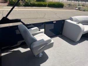 Premium boat captain chair with surrounding deck for comfort and navigation.