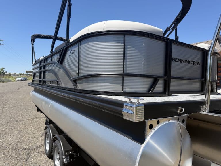 Modern Bennington pontoon boat with sleek design, perfect for leisure and water adventures.