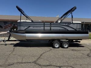 Bennington pontoon boat with dual Bimini tops and modern design.