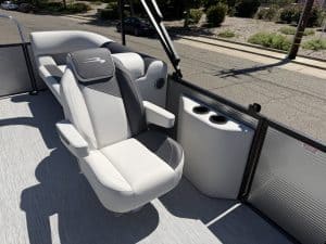High-quality captain seat on a modern pontoon boat for comfortable cruising.