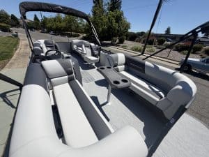 Pontoon boat with spacious seating and modern design for leisure and water activities.