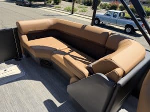 Luxury boat seating with beige cushions on a Bennington M 23 model.