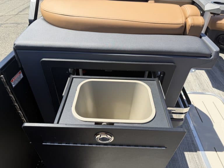 Golf cart with built-in storage compartment and beige seat.