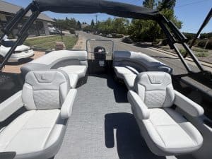 Luxury boat seating with plush white cushions and modern design for optimal comfort on the water.