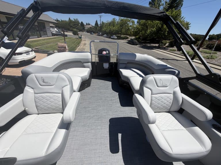 Luxury boat seating with plush white cushions and modern design for optimal comfort on the water.