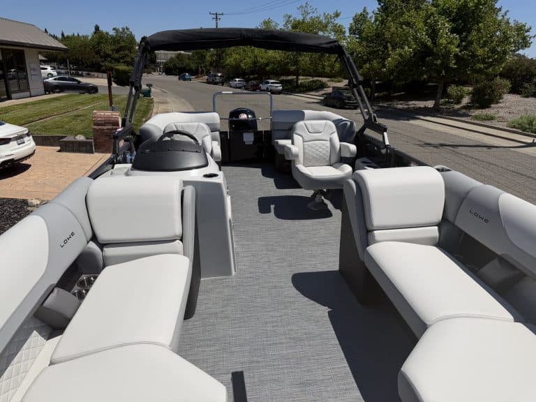Luxury pontoon boat with spacious seating and modern design for leisure and water adventures.