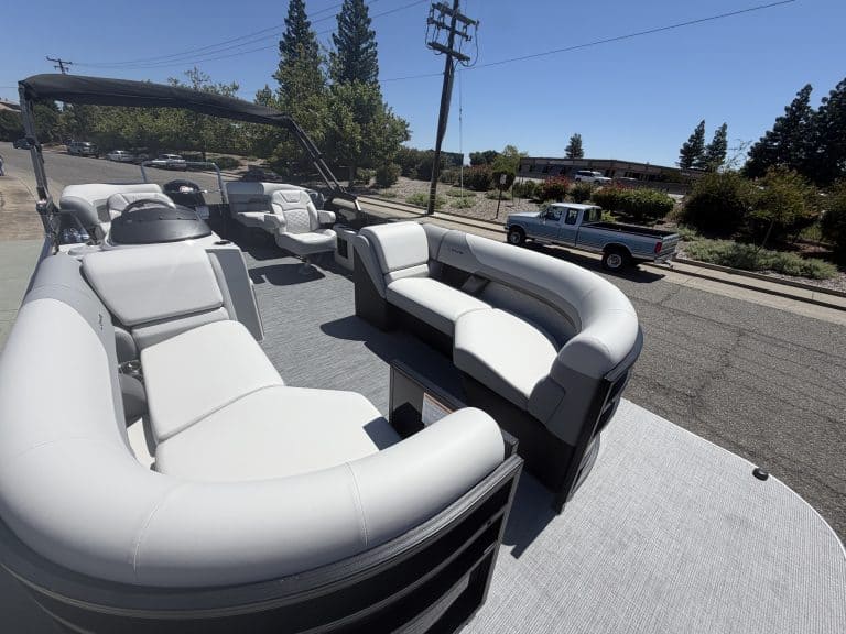 Luxury pontoon boat with spacious seating, perfect for leisure and fishing. Ideal for family outings.