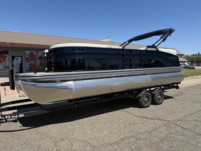 Modern luxury pontoon boat with black and silver design, perfect for leisure and water adventures.
