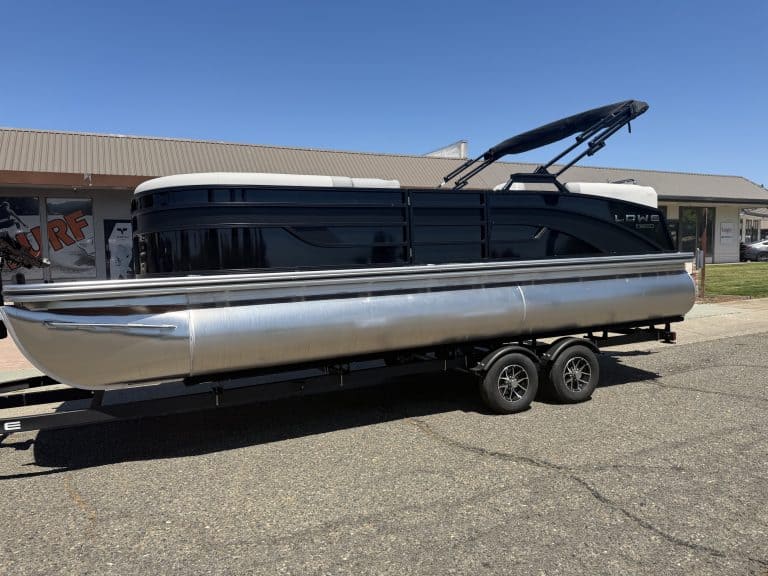 Modern pontoon boat with black and silver design, ready for water adventures.
