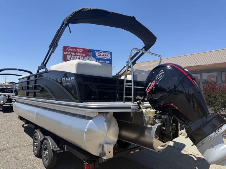 Pontoon boat with powerful outboard motor, ideal for leisure and fishing activities. Perfect for wat.