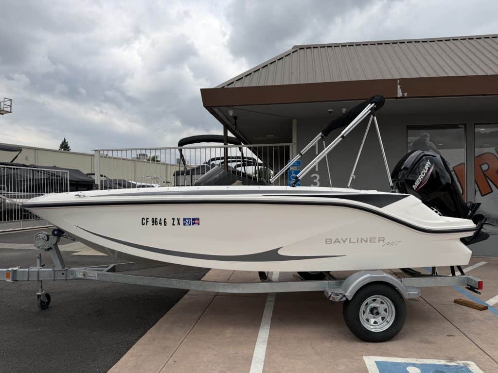 Modern Bayliner boat on trailer at ASFB Marine dealership.