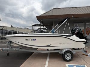 Modern Bayliner boat on trailer at ASFB Marine dealership.