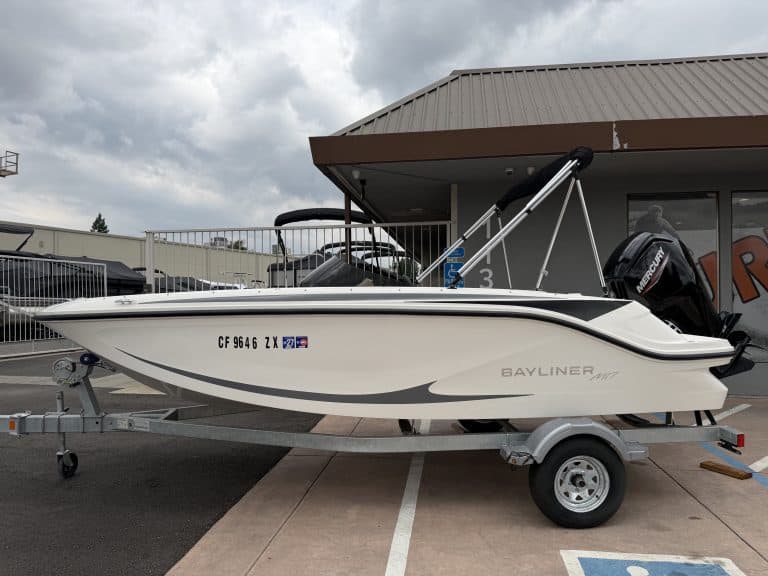 Modern Bayliner boat on trailer at ASFB Marine dealership.
