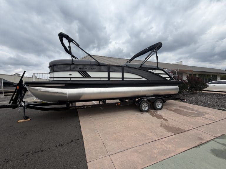 Bennington pontoon boat on trailer, ideal for leisure and water activities.