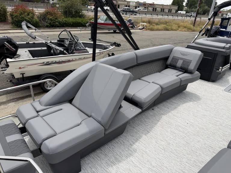 Luxury pontoon boat seating with gray upholstery for comfort and style.