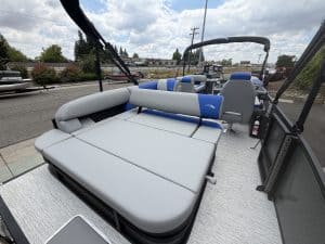 Pontoon boat with spacious seating, ideal for leisure, fishing, and water sports. Perfect for family.
