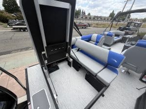 Modern boat lounge with comfortable seating and storage compartments for relaxation on the water.