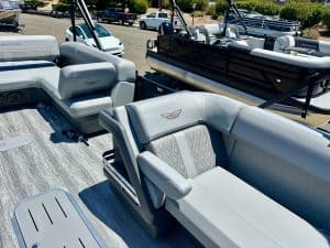 Luxury boat seating area with modern cushions and deck flooring.