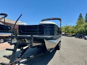 Pontoon boat with premium features for leisure and fishing.