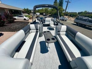 Pontoon boat with spacious seating and modern design for leisure and fishing. Perfect for family out.