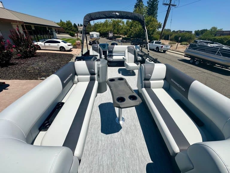 Pontoon boat with spacious seating and modern design for leisure and fishing. Perfect for family out.