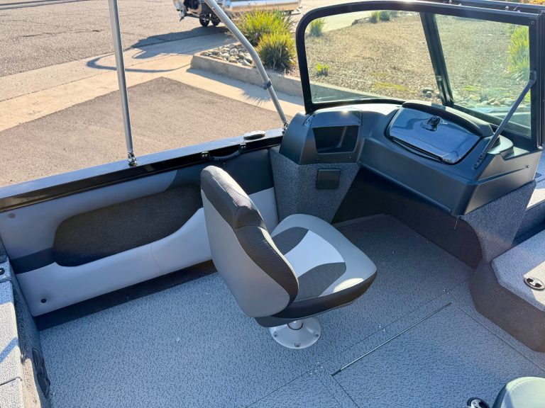Boat cockpit with advanced navigation and control panel for marine safety and operation.