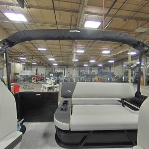 Modern boat seating with marine upholstery in a manufacturing facility.