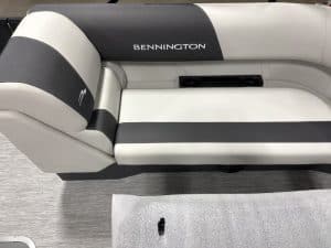 Modern Bennington pontoon boat with sleek design and comfortable seating for leisure boating.