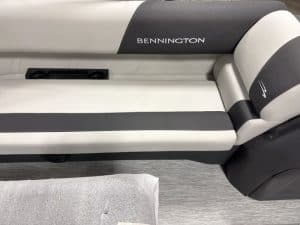 Bennington pontoon boat seat with comfortable cushions and sleek design.