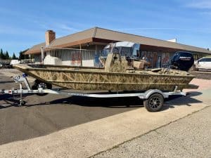 Crestliner fishing boat on trailer at ASFB Marine dealership.