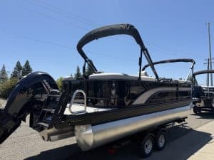 Modern pontoon boat with Mercury outboard motor, ideal for leisure and water activities.