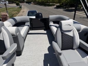 Pontoon boat seating with comfortable, stylish cushions for relaxing on the water.