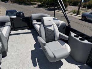 Luxury pontoon boat captain seat with modern design and comfort.