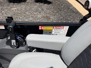All-Terrain Utility Vehicle dashboard with safety warnings and controls.