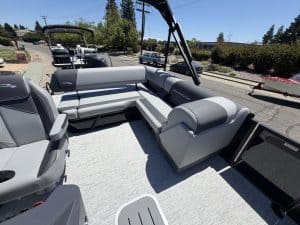 Pontoon boat interior with spacious seating and modern design.