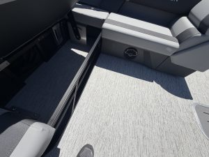 Comfortable boat seating with storage compartments on a modern yacht.